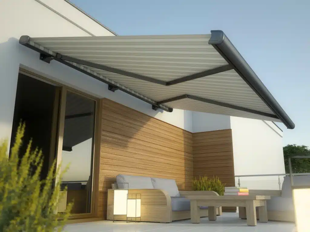 black and white retractable awning over back deck of home