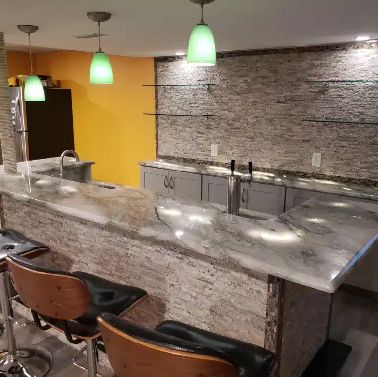 kccs basement remodel marble bar with beer tap
