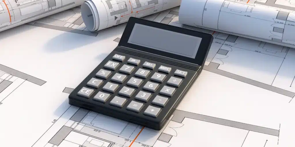 calculator and blue prints