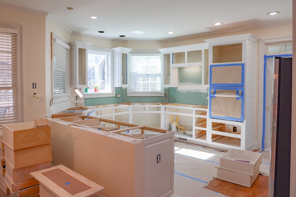 remodeling of kitchen cabinets ready for a granite countertops in a beautiful house
